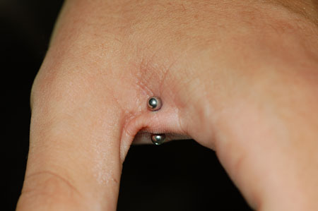 Hand piercing cheap